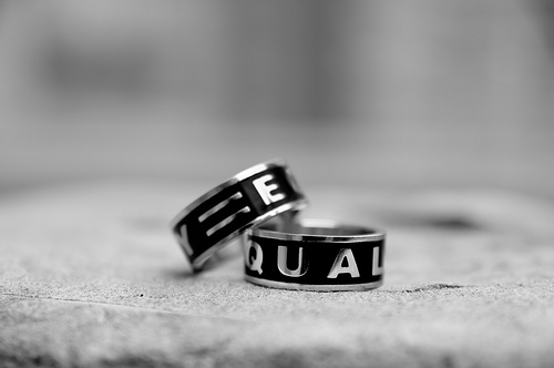 Two rings with the word equality on each