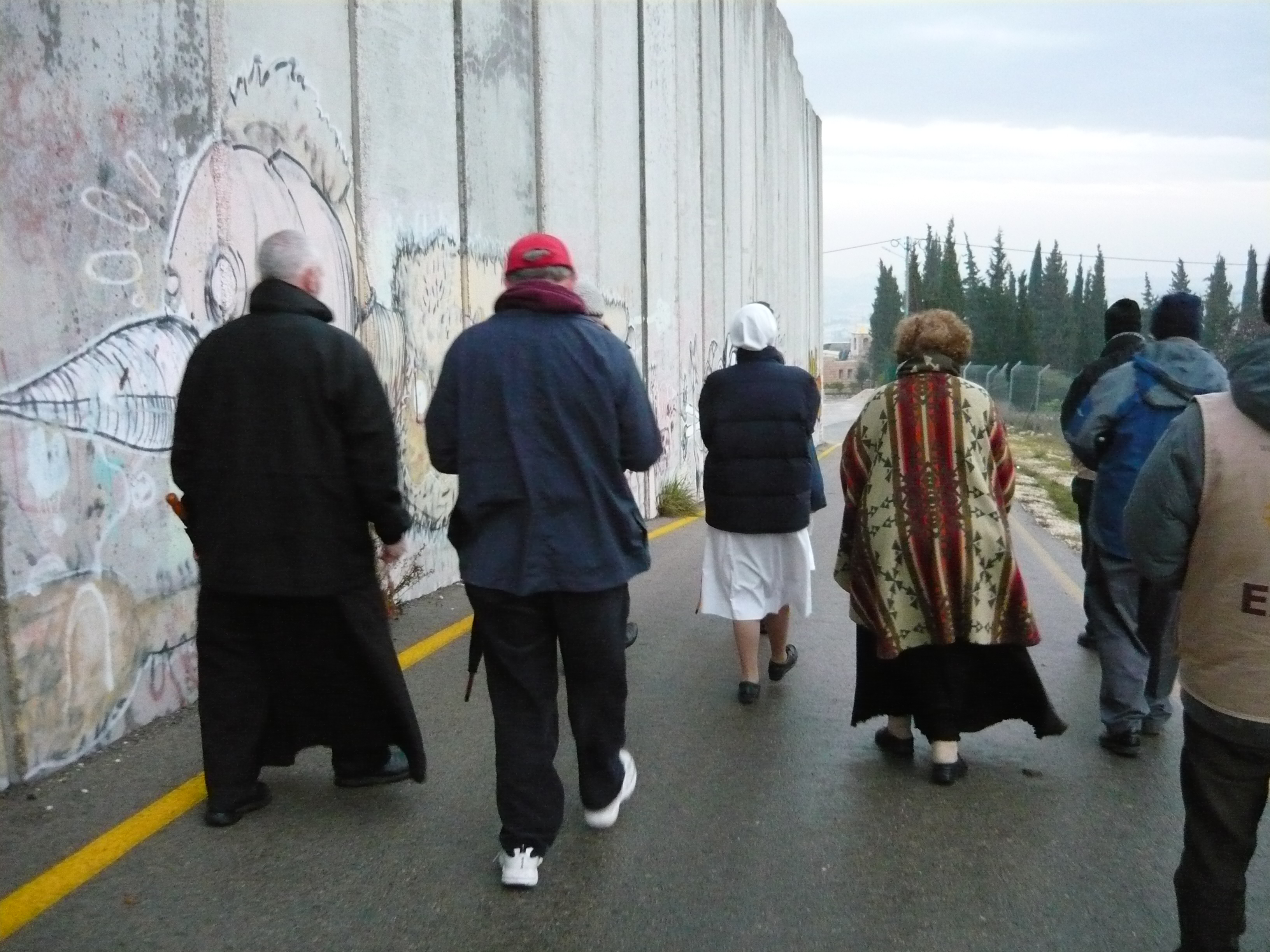 People of faith walking alongside the Separation Barrier